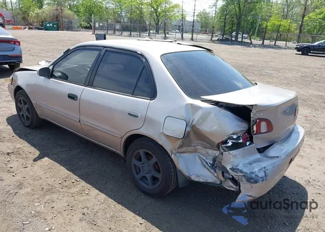 1999 Toyota Corolla Le z USA, uszkodzony, nr VIN 2T1BR12E2XC192065